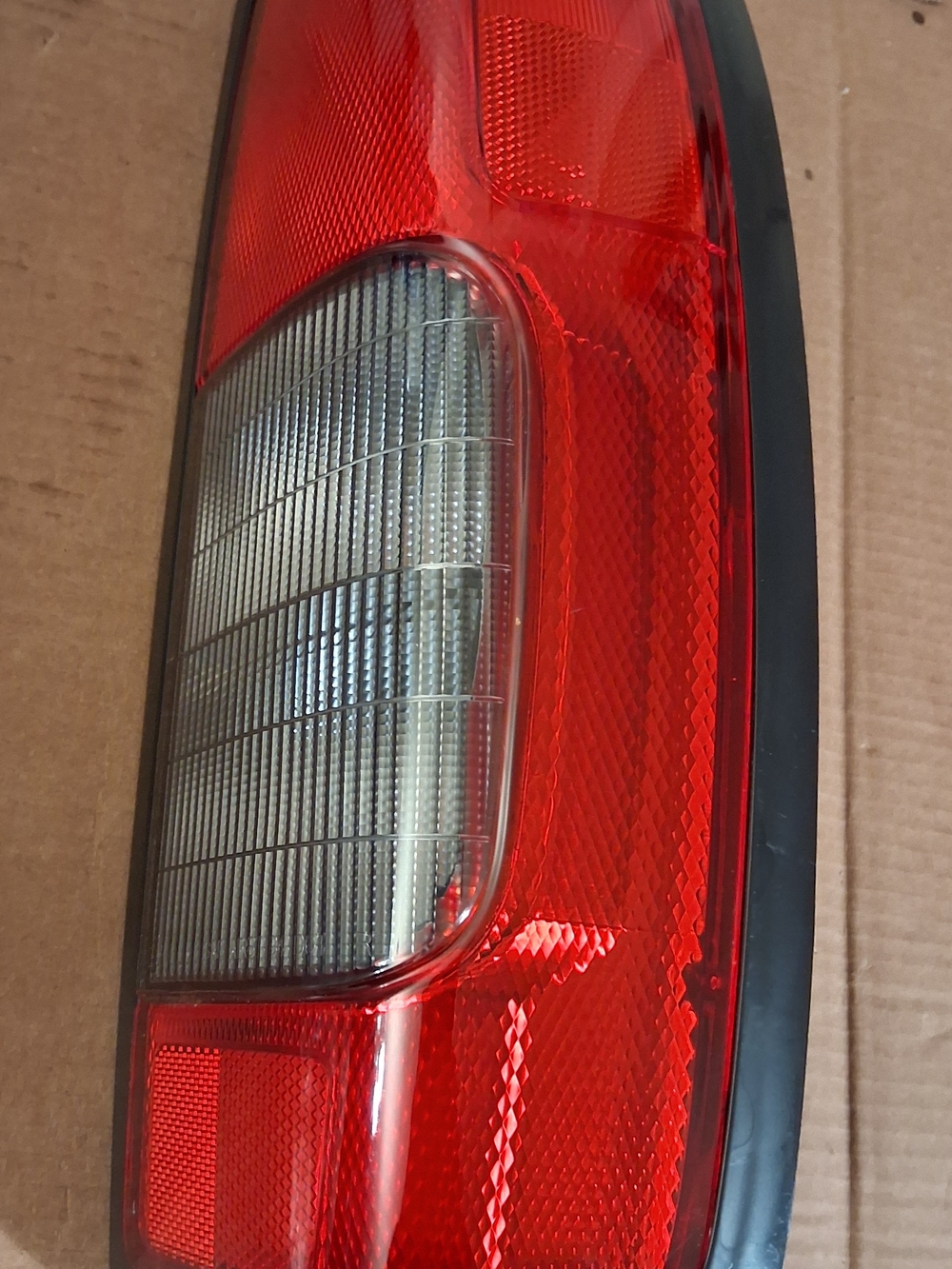 2000-2004 Nissan Frontier Passenger Side Tail Light Housing With Hardeare